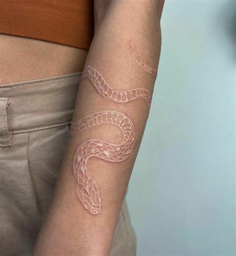 snake gucci tattoo|snake wrap around arm tattoo.